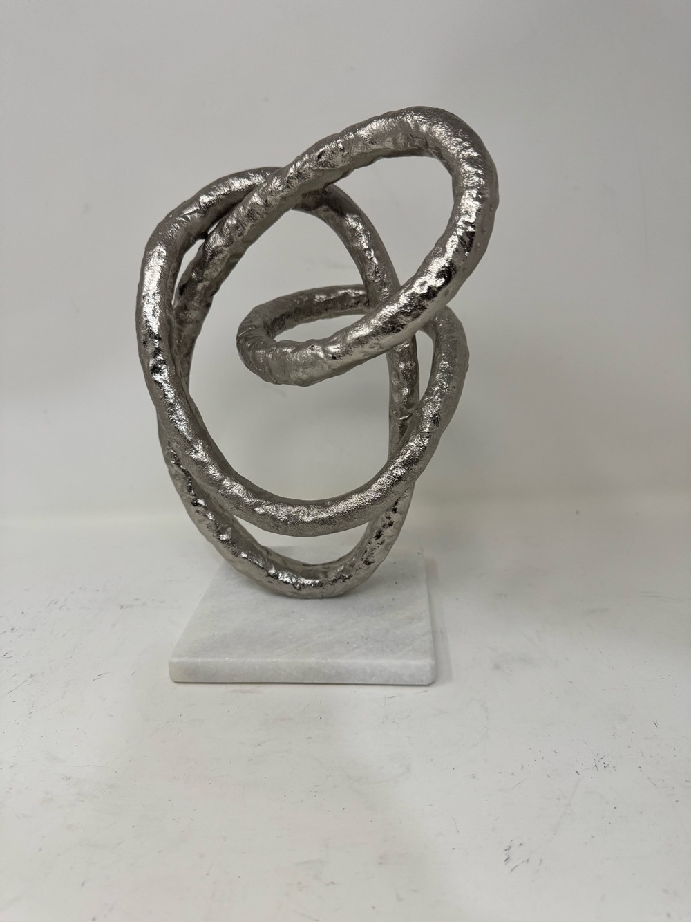 Modern Interlocking Loop Sculpture - Silver on marble base preowned